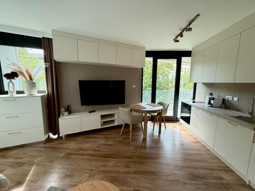 Η κουζίνα ή μικρή κουζίνα στο APARTAMENTY ARTE LUBLIN Unia Art Residence 44 faktura VAT