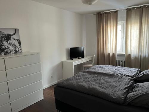 Una cama o camas en una habitación de Gästehaus Gerschler