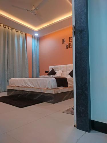 Postel nebo postele na pokoji v ubytování Hotel HM GRAND