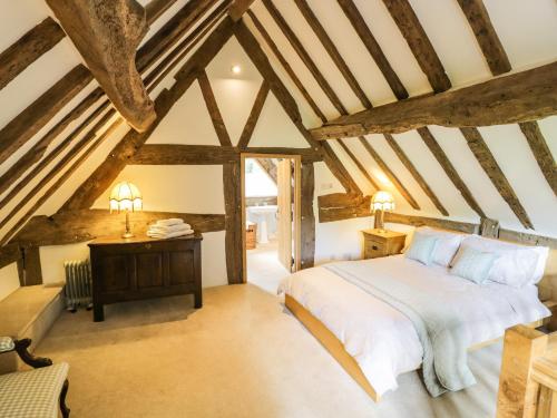 Postel nebo postele na pokoji v ubytování Manor Cottage