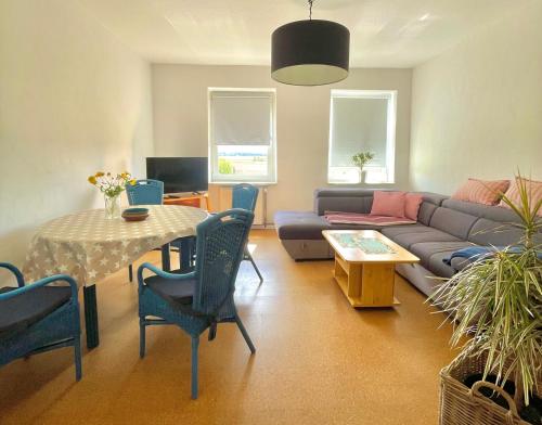 Khu vực ghế ngồi tại "Willkommen im Zetthaus" Welcome! Witamy! Vitejte! - Familienfreundliche Ferienwohnungen in der Mecklenburger Seenplatte