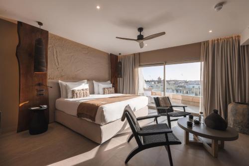 Ένα ή περισσότερα κρεβάτια σε δωμάτιο στο Verdala Wellness Hotel AX Privilege - Adults Only