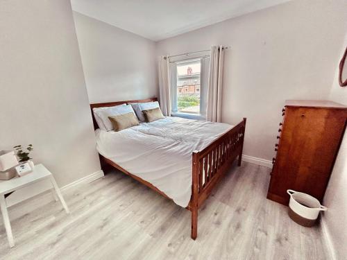 Postel nebo postele na pokoji v ubytování Little Willow Belfast