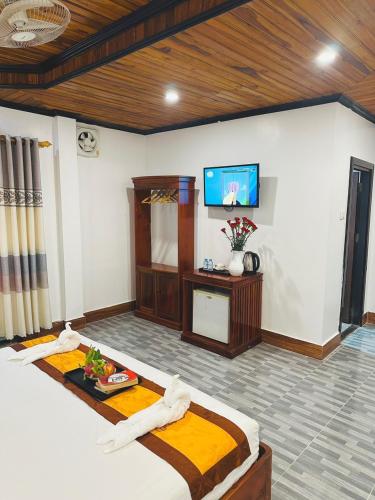 Televisyen dan/atau pusat hiburan di Oudomlith Villa Luang Prabang
