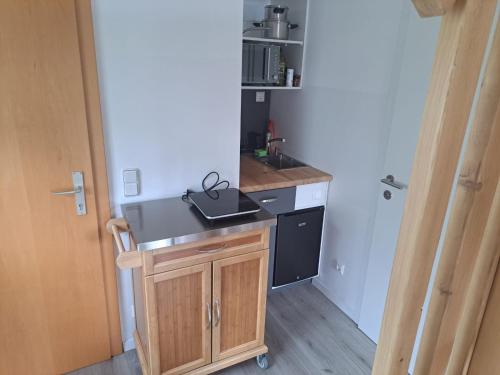 a small kitchen with a counter and a sink at Mini Loft 30 - Apartment 3 