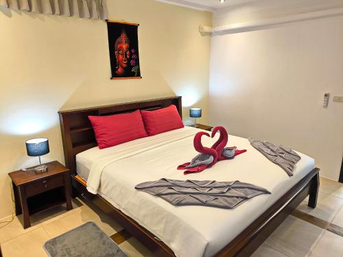 Ένα ή περισσότερα κρεβάτια σε δωμάτιο στο Blue Haven Bay Villa 21C