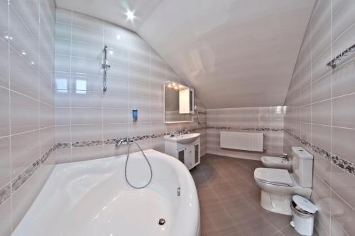 Koupelna v ubytování Hotel Svetlitsa