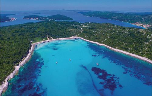 an aerial view of a beach with blue water at Nice Apartment In Sali With Wifi in Sali