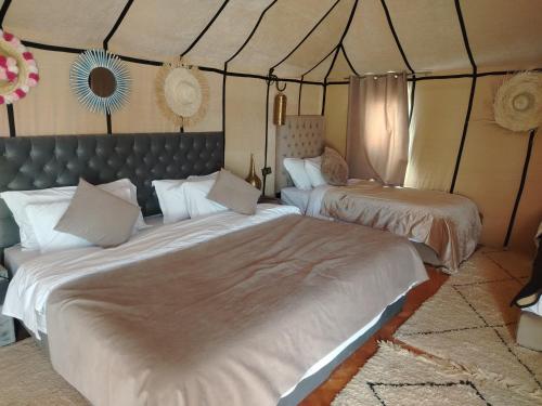 Ένα ή περισσότερα κρεβάτια σε δωμάτιο στο Siman luxury camp