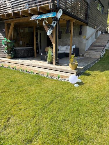 a skateboard in the air in front of a house at Bingo apartaments in Hønefoss