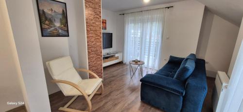 Televisyen dan/atau pusat hiburan di Apartman Swans