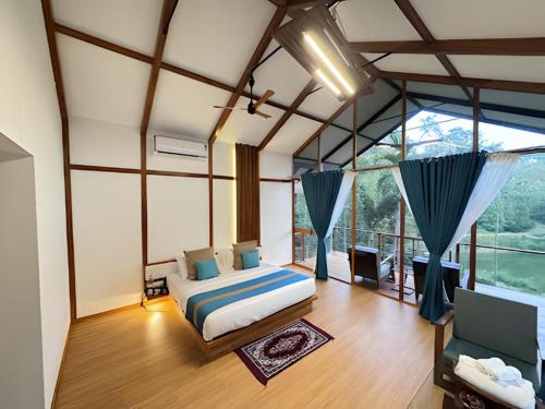 Katil atau katil-katil dalam bilik di Cozinn B827 in Chikkamaglur