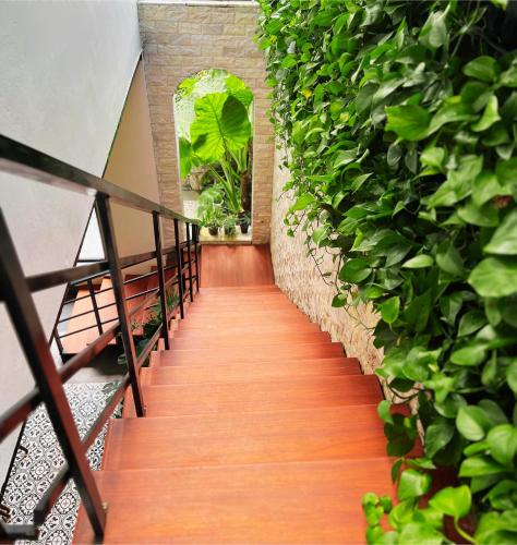 a stairway with a green wall of plants at Sapa Villa Florence in Sa Pa