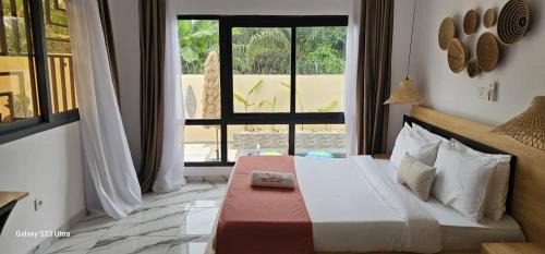 Llit o llits en una habitació de Villa Diniyo