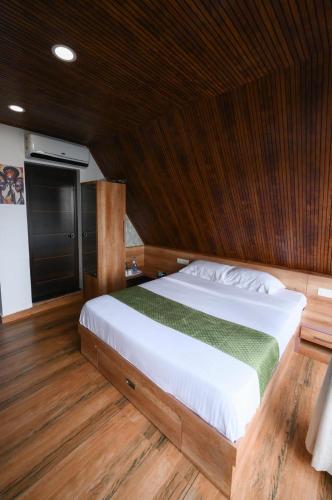 Katil atau katil-katil dalam bilik di Heaven-Vadanapilly Beach Villa