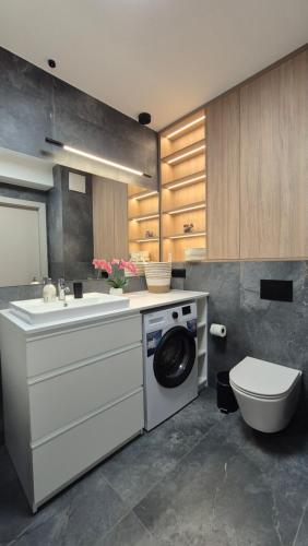 Η κουζίνα ή μικρή κουζίνα στο Towarowa Nature Apartment, free parking, air-conditioning, self check-in 24h