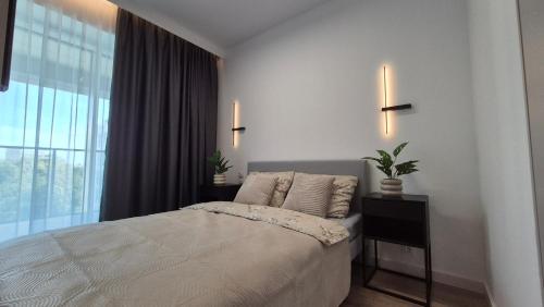 Ένα ή περισσότερα κρεβάτια σε δωμάτιο στο Towarowa Nature Apartment, free parking, air-conditioning, self check-in 24h