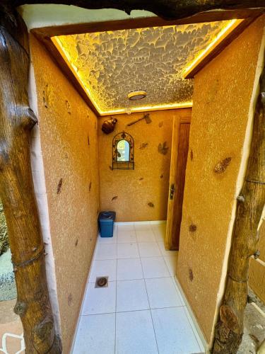 a hallway in a house with a ceiling at Villa Mouloud, arougou khenifra in Arrougou
