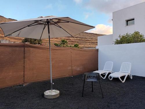 En terrasse eller udendørsområde på Casa Rinaifi