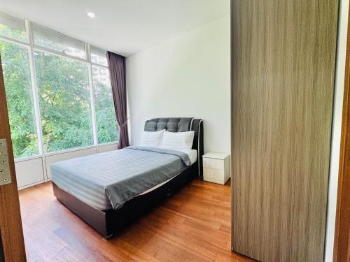 Postel nebo postele na pokoji v ubytování Apartment Vortex klcc for 6pax & 4pax