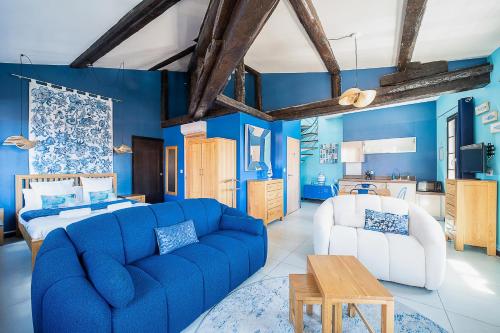 Coin salon dans l'établissement Urban Getaway Maillol Suite in the Center with Free Wifi
