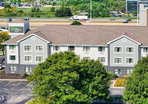 an aerial view of a building with trees at Extended Stay America Suites - Cleveland - Beachwood - Orange Place - South in Orange