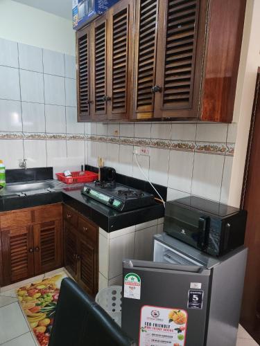 Η κουζίνα ή μικρή κουζίνα στο Studio nyali apartment