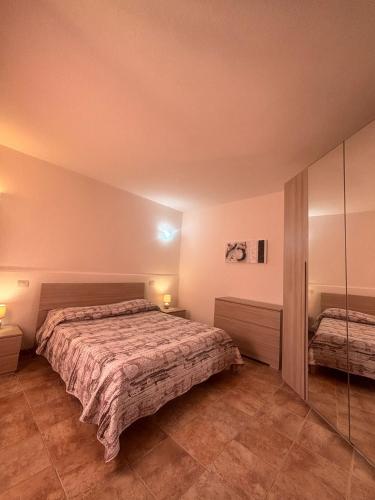 タナウネッラにあるVista Mare Houseのベッドルーム1室(ベッド1台付)