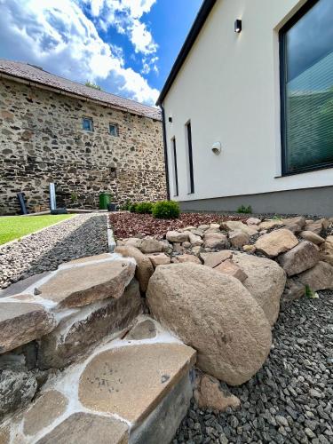 a stone walkway in front of a building at Altitude 2 Matra in Mátraszentimre