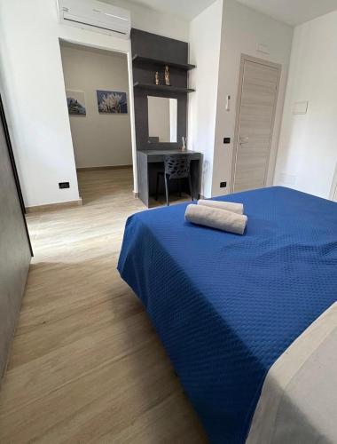 Ένα ή περισσότερα κρεβάτια σε δωμάτιο στο Ottolune Accomodations