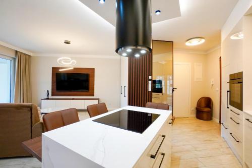 Μια τηλεόραση ή/και κέντρο ψυχαγωγίας στο Baltic Waves Resort by Baltic Home