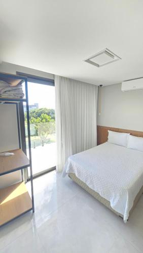 Katil atau katil-katil dalam bilik di Casa Go Reserva Sauipe