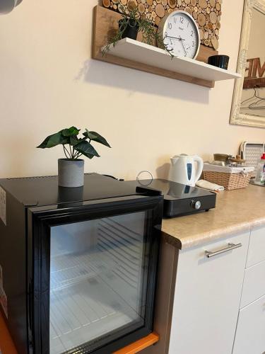 Kuchyň nebo kuchyňský kout v ubytování SweetHome