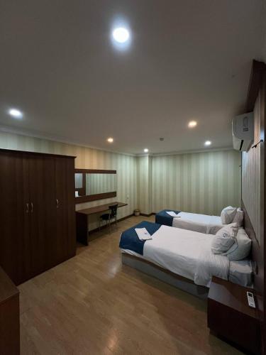Postel nebo postele na pokoji v ubytování زاده هوتيل - Zade Hotel