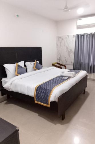 Katil atau katil-katil dalam bilik di Samudra Inn Hotel