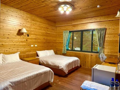 Voodi või voodid majutusasutuse He Ya Leisure Land B&B toas