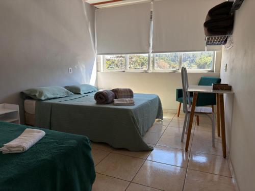 Ένα ή περισσότερα κρεβάτια σε δωμάτιο στο Hotel Longra