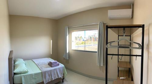 Ένα ή περισσότερα κρεβάτια σε δωμάτιο στο Essenza Loft