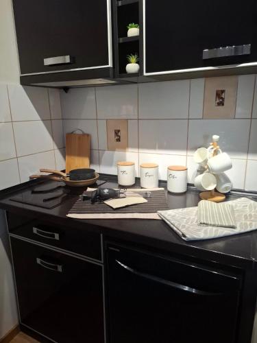 Una cocina o zona de cocina en Apartman Una