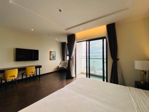 Ένα ή περισσότερα κρεβάτια σε δωμάτιο στο Aura Stay- Ocean View Studio