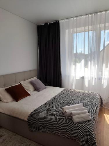 Кровать или кровати в номере CityPark Stay