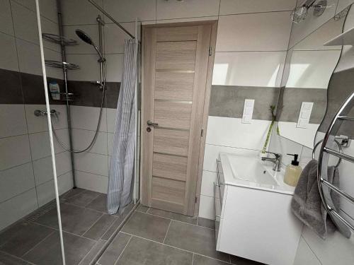 Koupelna v ubytování Tó Apartman
