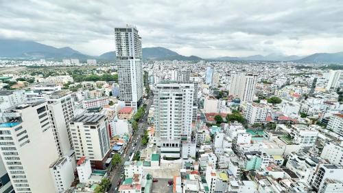 an aerial view of a city with tall buildings at Tropical Ocean Escape Nha Trang in Nha Trang