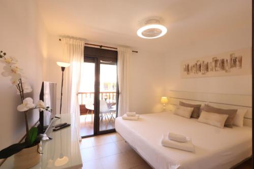 Ένα ή περισσότερα κρεβάτια σε δωμάτιο στο SunSet Mocan