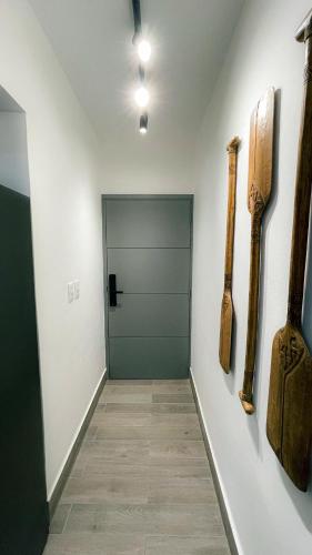 a hallway with a door in a room at Modern, Comfortable, Close to Beaches in Colorado