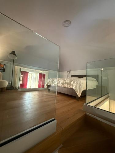 Ένα ή περισσότερα κρεβάτια σε δωμάτιο στο Maison MoDì