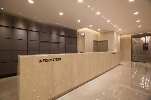 Lobby/Rezeption in der Unterkunft GnB Hotel