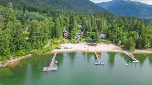 an aerial view of a beach with boats in the water at Custom Built Home on the Beach in Nelson