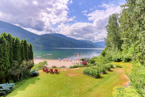 a view of a beach with a group of horses at Custom Built Home on the Beach in Nelson