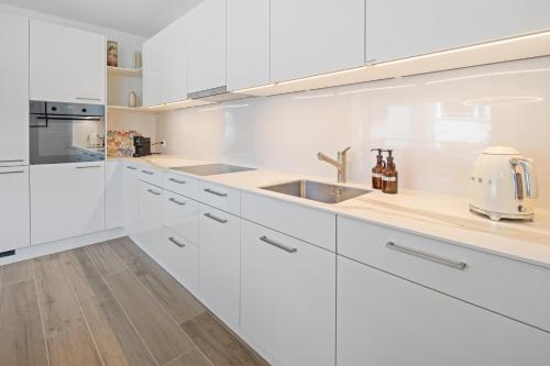 Una cocina o zona de cocina en BLIV Design-Apartment mit Parkplatz, nahe Zentrum